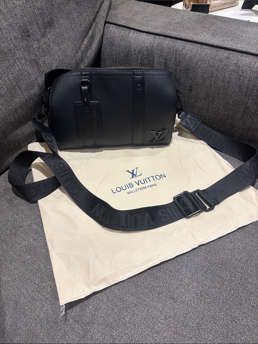 Louis Vuitton Black Pebbled Leather Messenger Bag with Branded Strap